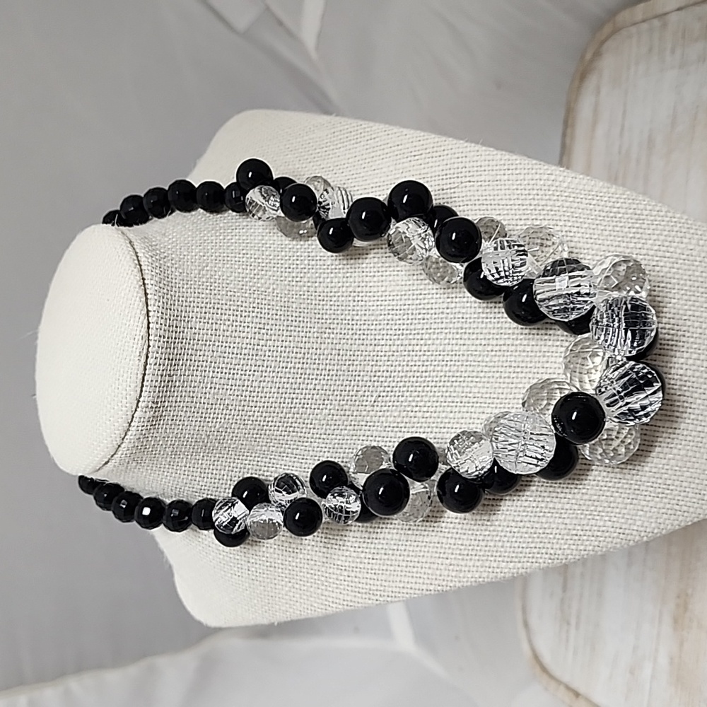 Beautiful cluster faceted beads black and clear